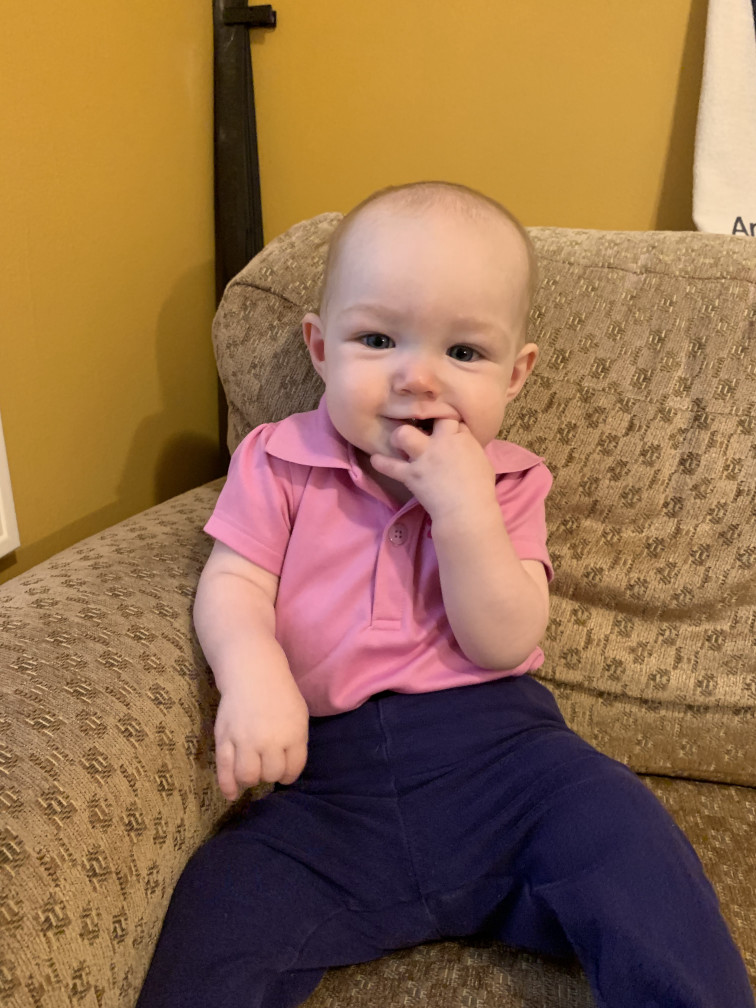 Clara in her golf shirt.